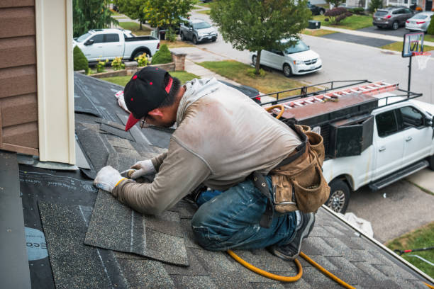 Professional Storm Damage Roof Repair technician working in West New York, NJ